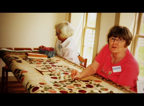 Hand quilting still takes place at the village.